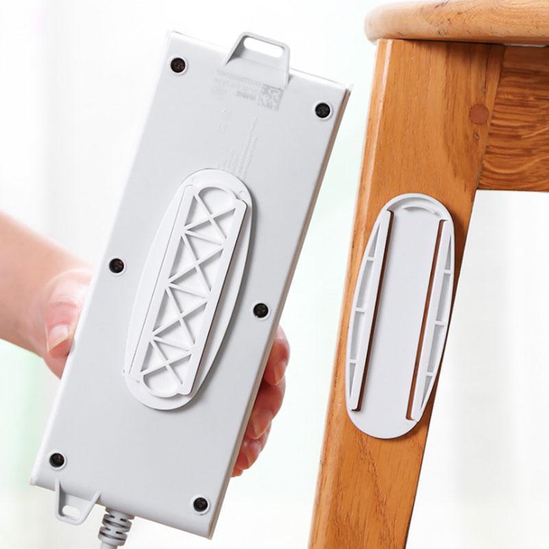 🥳 2026 Best Seller 🥳💞 Over 50,000 units sold! 🔌🪝 50% off! This self-adhesive desktop outlet mount securely holds power outlets, routers, and remote controls—keeping cables neat and organized while ensuring home safety! 🏠✨