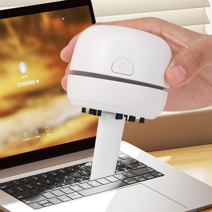 Mini Desktop Vacuum Cleaner with Long Battery Life—Perfect for Both Desktop and Car Use! With powerful suction, it effortlessly cleans hard-to-reach spots.