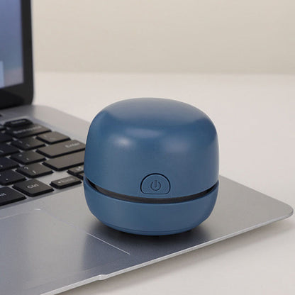 Mini Desktop Vacuum Cleaner with Long Battery Life—Perfect for Both Desktop and Car Use! With powerful suction, it effortlessly cleans hard-to-reach spots.
